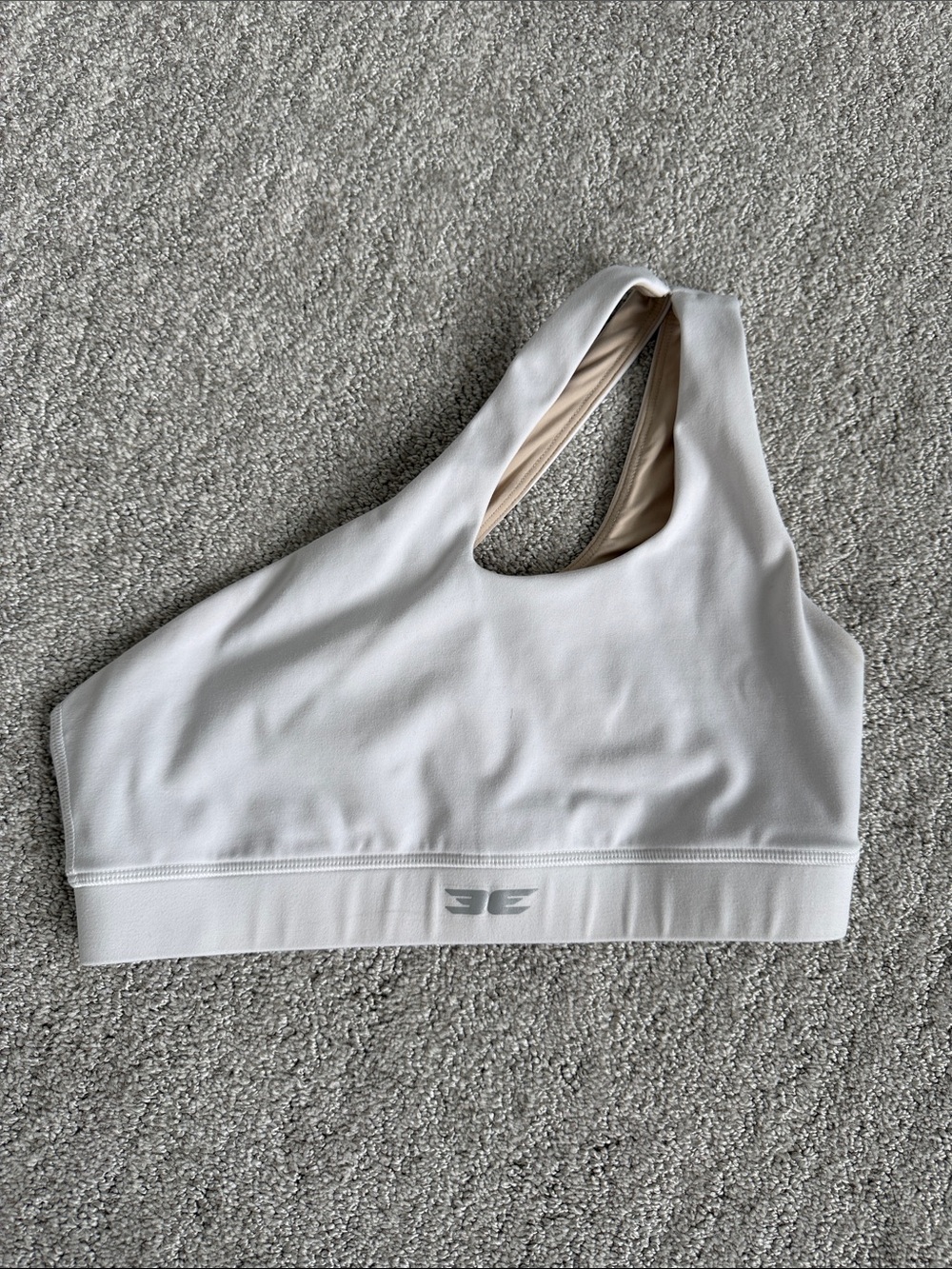 Asymmetric White Sports Bra with Light Nude Lining